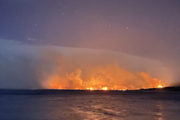 Dunedin man Andy Winneke caught sight of the blaze that may have destroyed several homes at Ohau seen from where he was camping about 4.30am on Sunday morning. Photo: Andy Winneke